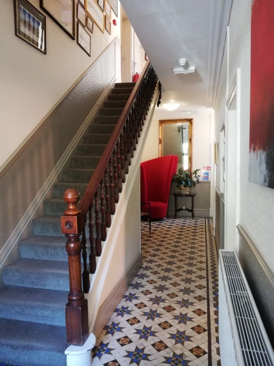 Tiled hallway and staircase