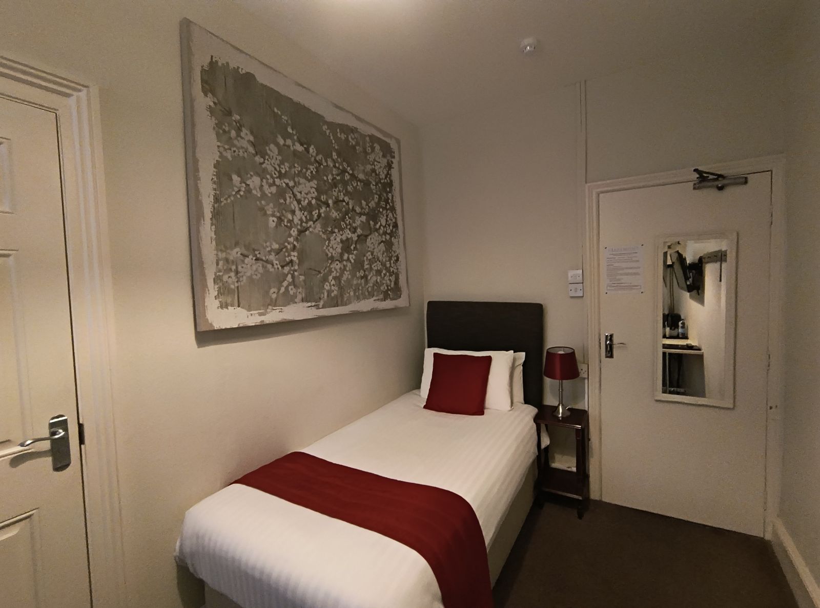 Single room with red throw